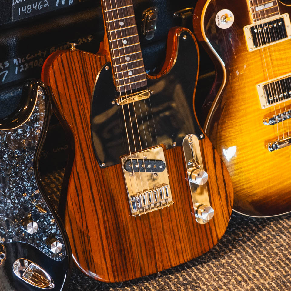 Shop the FRET12 curation of electric and acoustic guitars crafted by PRS Guitars, Furlan Guitars, Aluminati Guitars, and more.