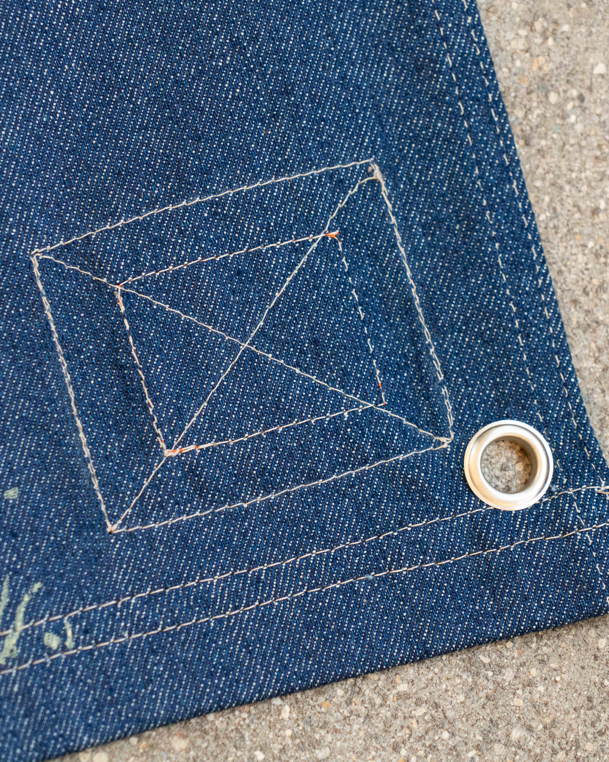 A one-of-one pennant designed and sewn by the FRET12 Studio.