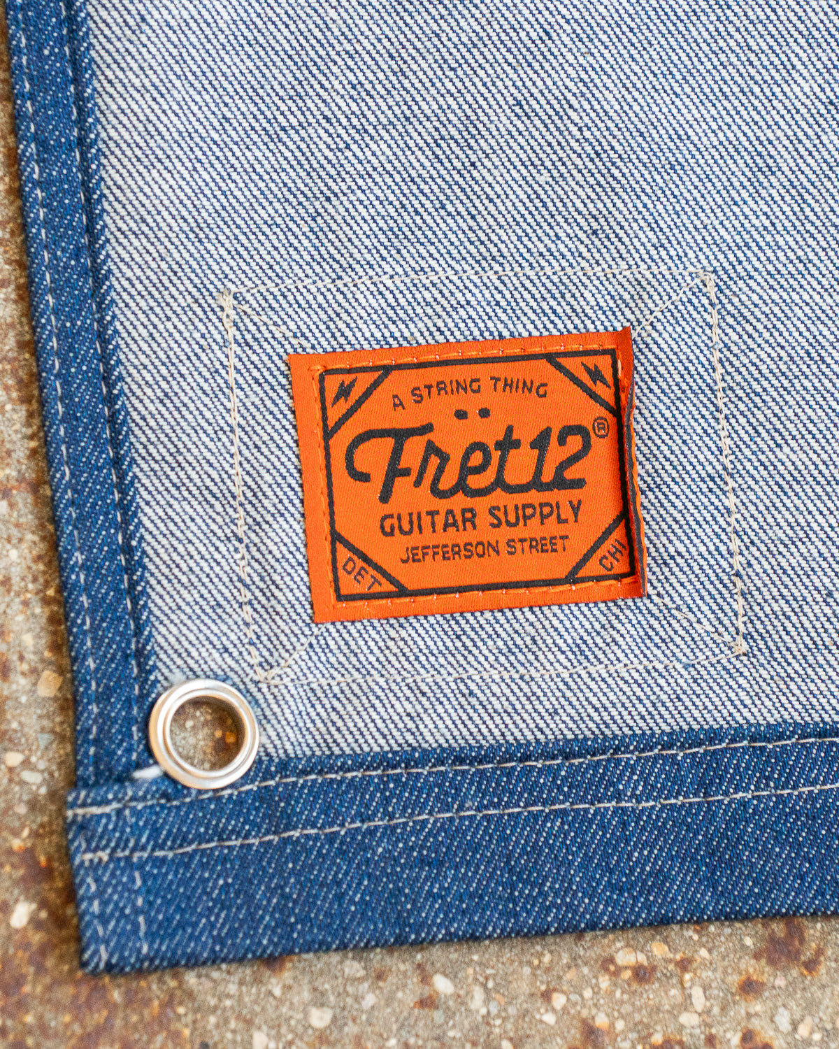 This one-of-one FRET12 Bronco pennant features a sewn woven label.