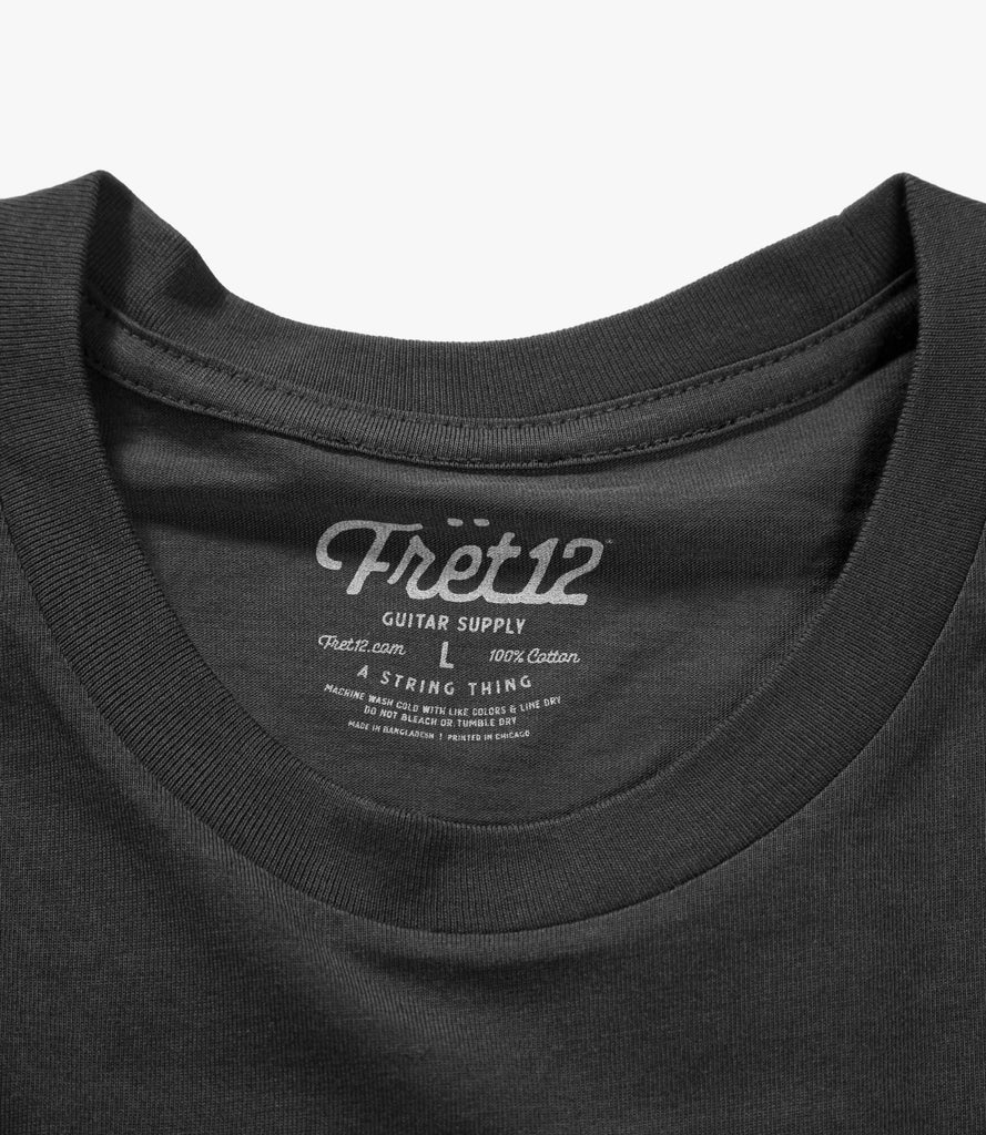 Closeup of printed Fret12 label on back of neck.
