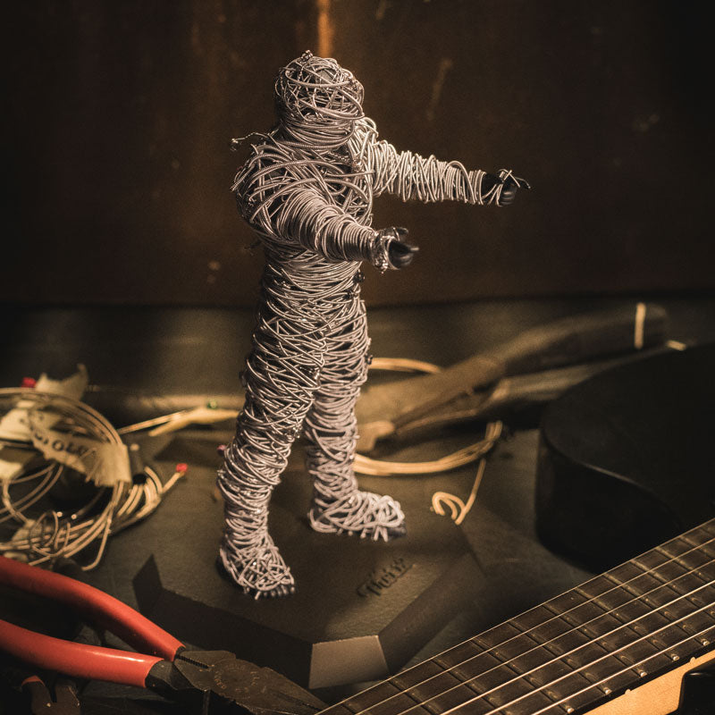 Haunted by Dead Guitar Strings? String Thing Lifts the Curse