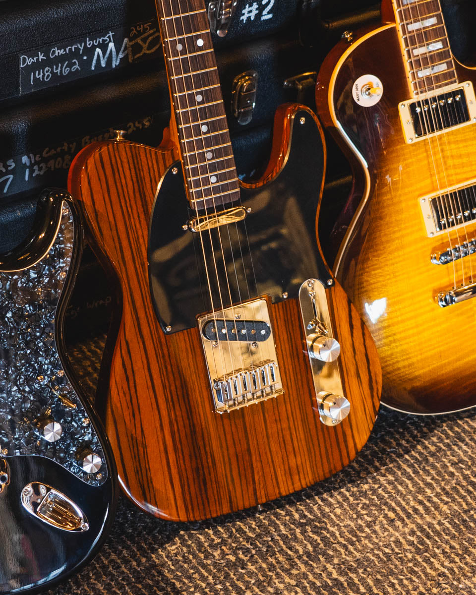 Shop the FRET12 curation of electric and acoustic guitars crafted by PRS Guitars, Furlan Guitars, Aluminati Guitars, and more.