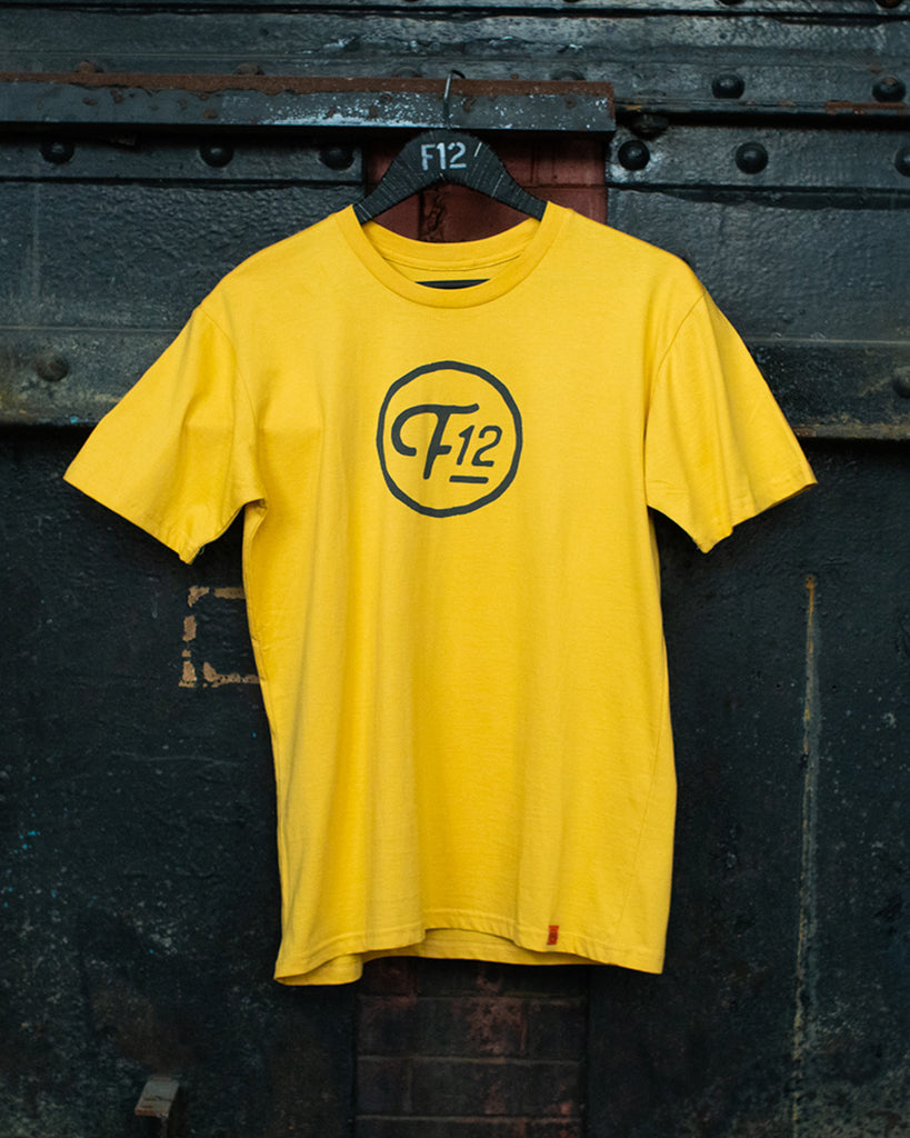 F12 CIRCLE SCRIPT LOGO TEE - MUSTARD