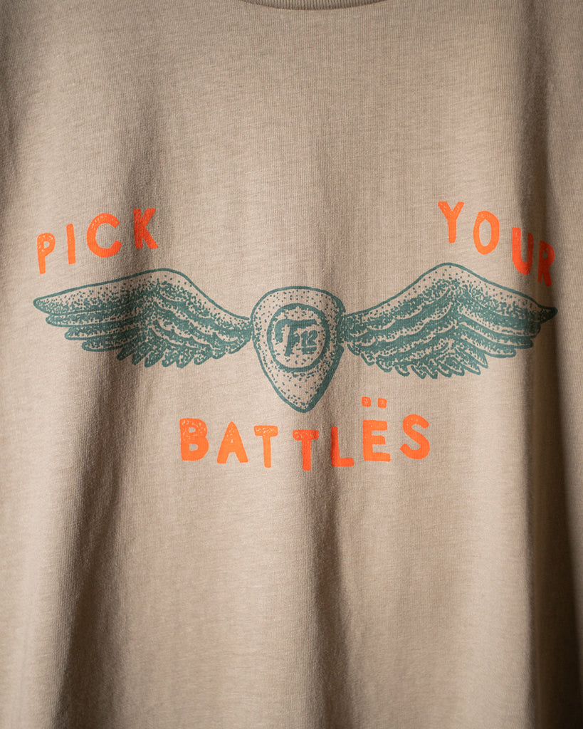 PICK YOUR BATTLES TEE - SAND
