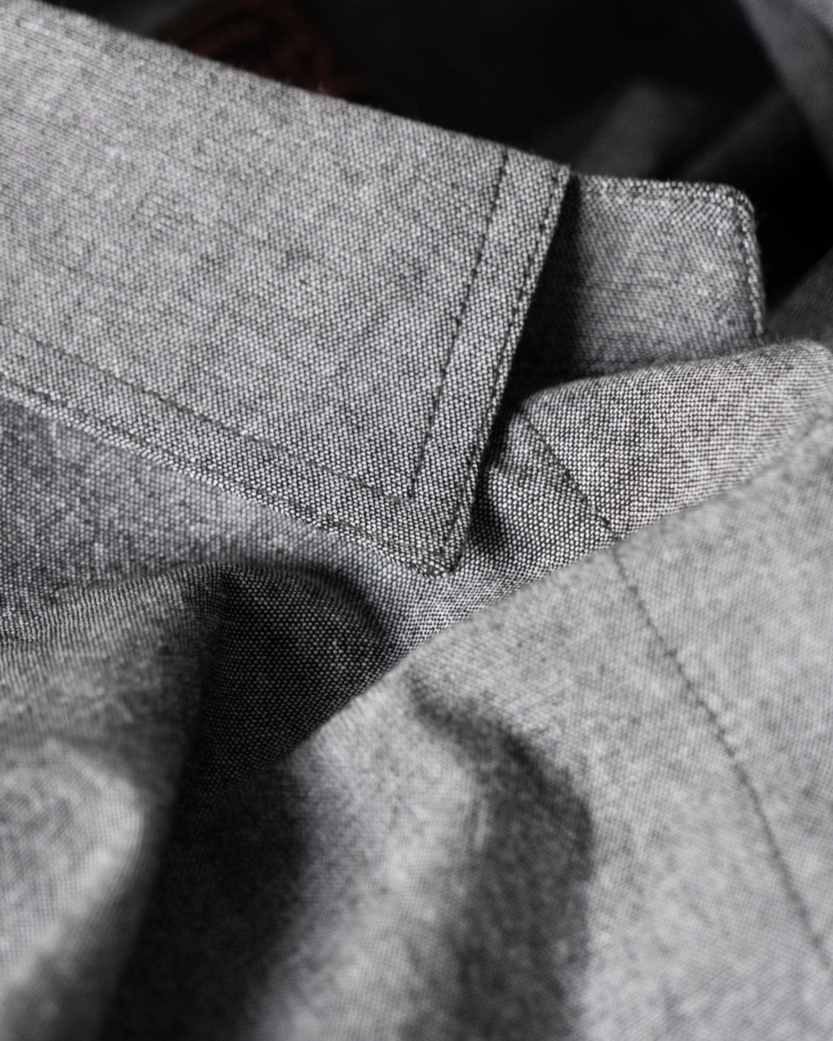 Close-up of gray fabric with a focus on texture and pattern