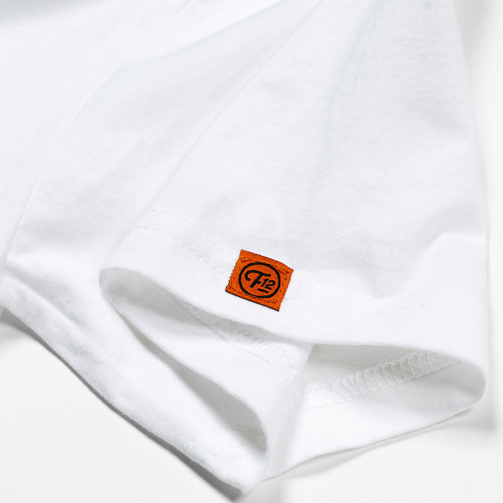 Closeup of orange FRET12 tag on sleeve