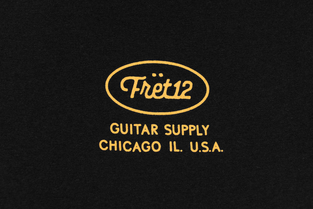 Closeup of the FRET12 circle logo with Guitar Supply, Chicago, IL. USA below it.