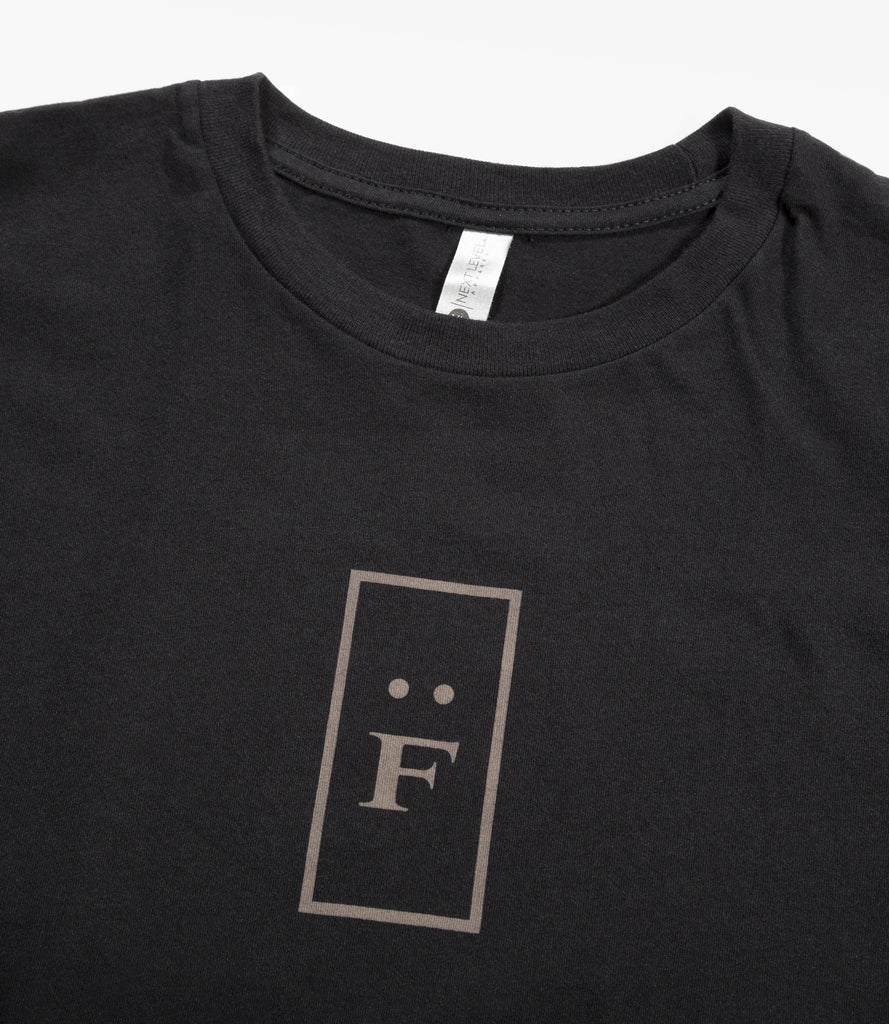 Closeup of "F" logo print.