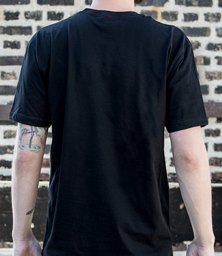 Back of model wearing black tee.