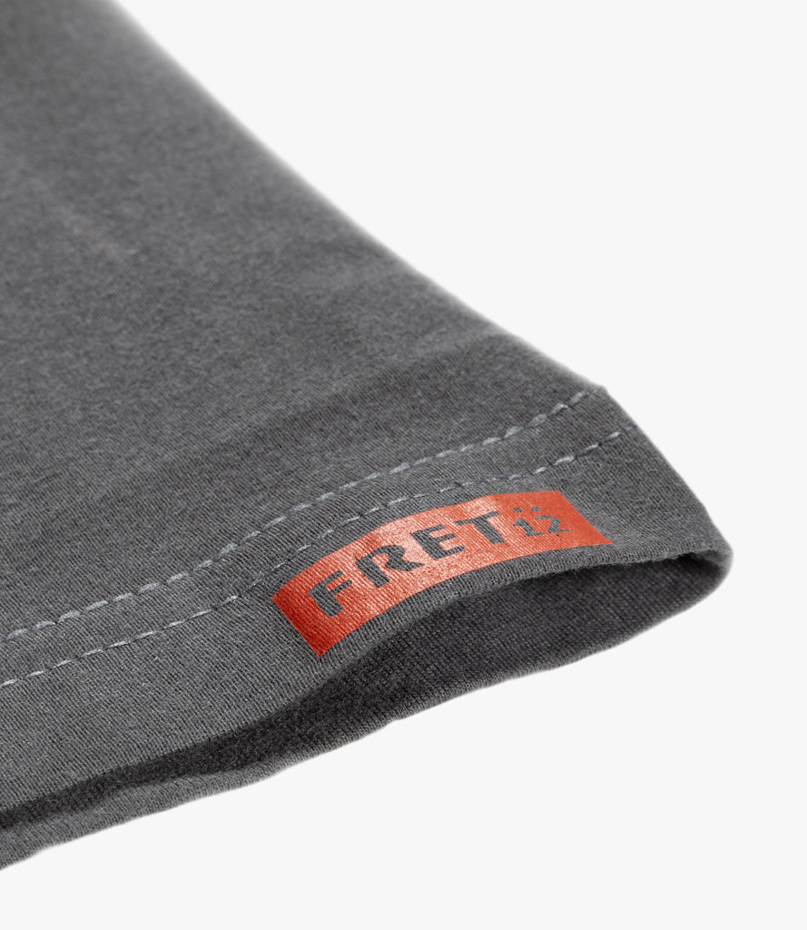 Closeup of printed Fret12 logo on left sleeve.